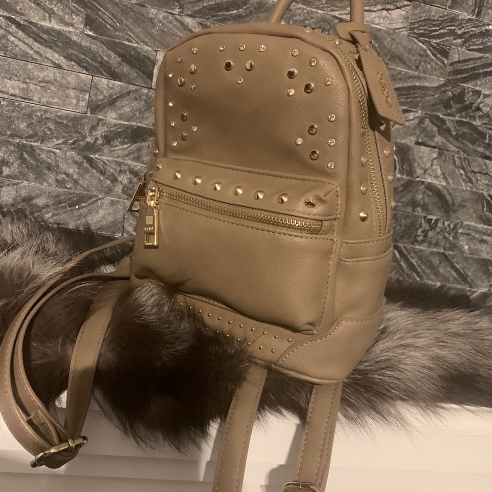 Bebe purse back pack tan never used